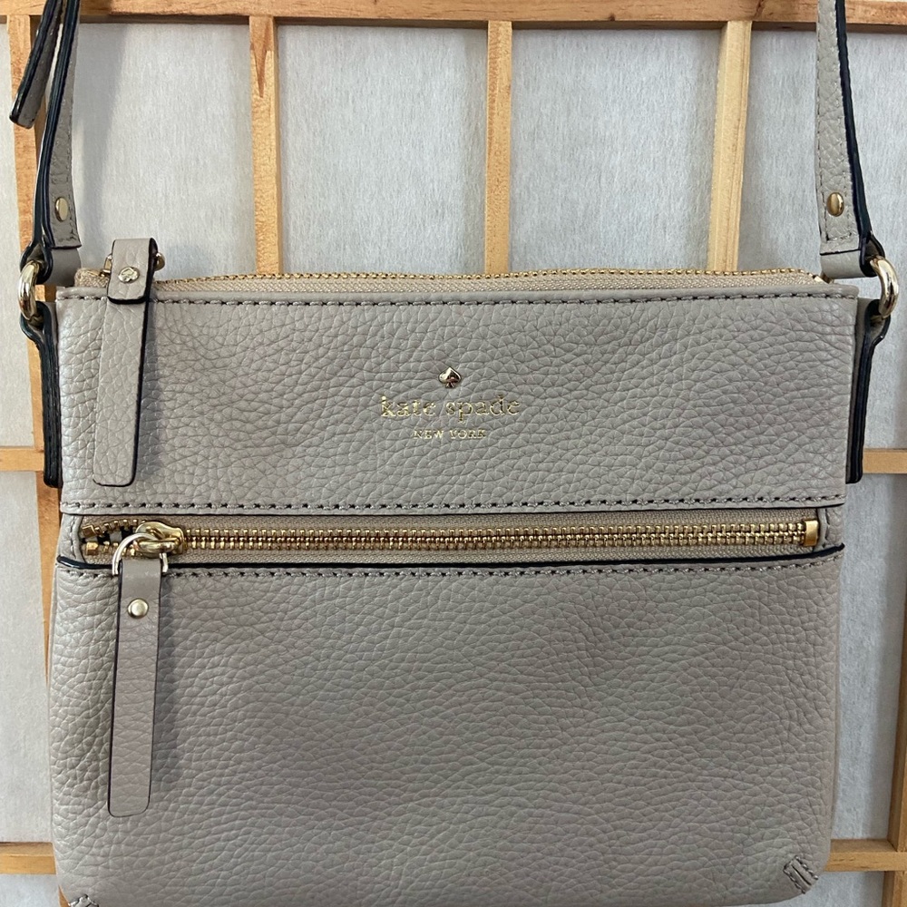 Kate Spade Light Gray Crossbody Bag with Gold Accents